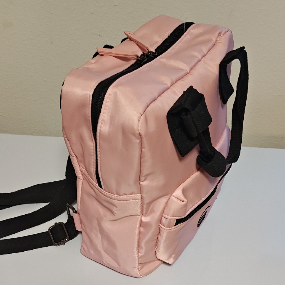 Elegant Pink Backpack with Black Accents